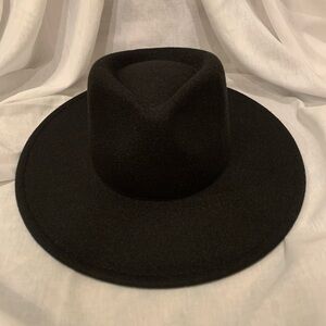 New stylish boutique,  black hat, never worn.